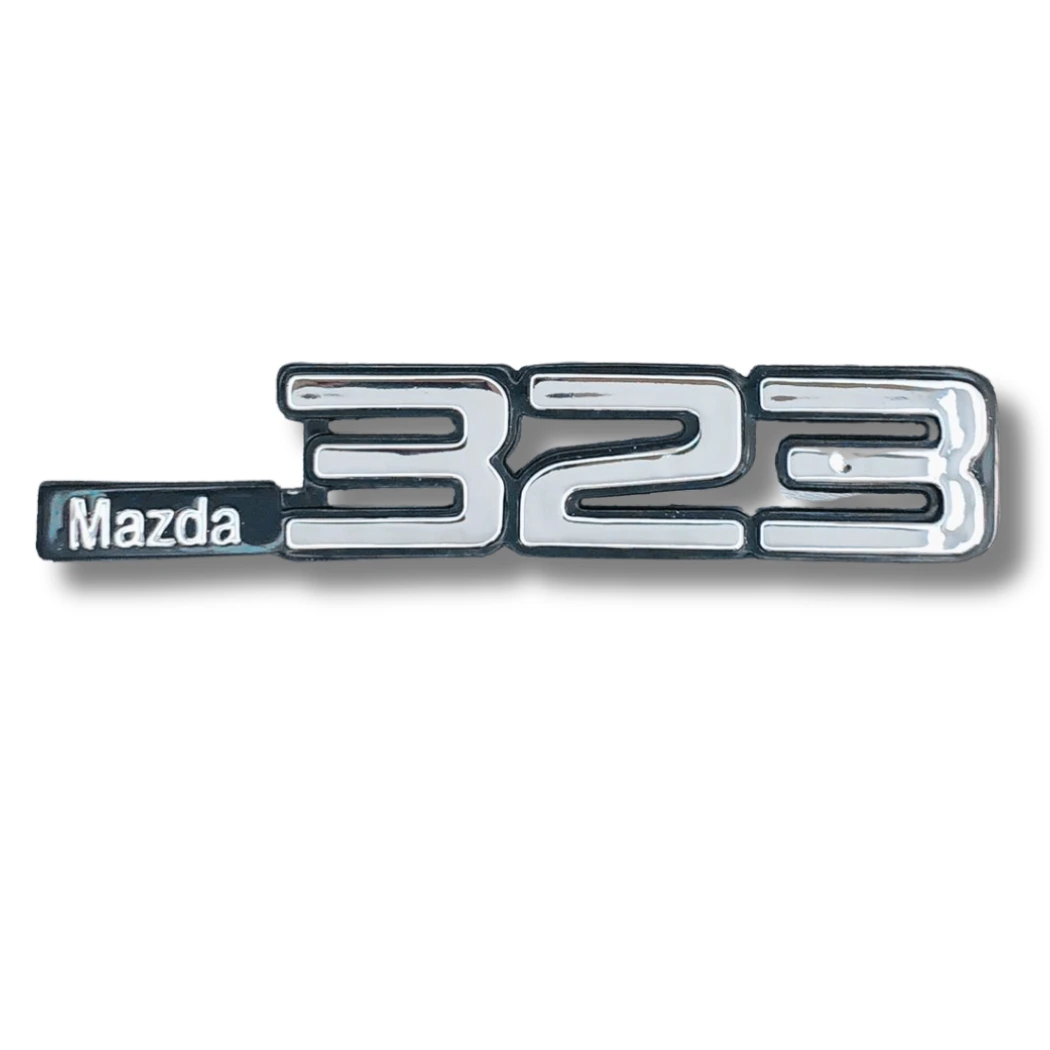 emblema-inyectado-mazda-323-t-o